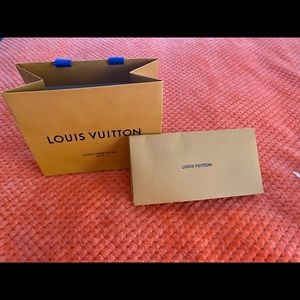Authentic Louis Vuitton shopping bag and envelope